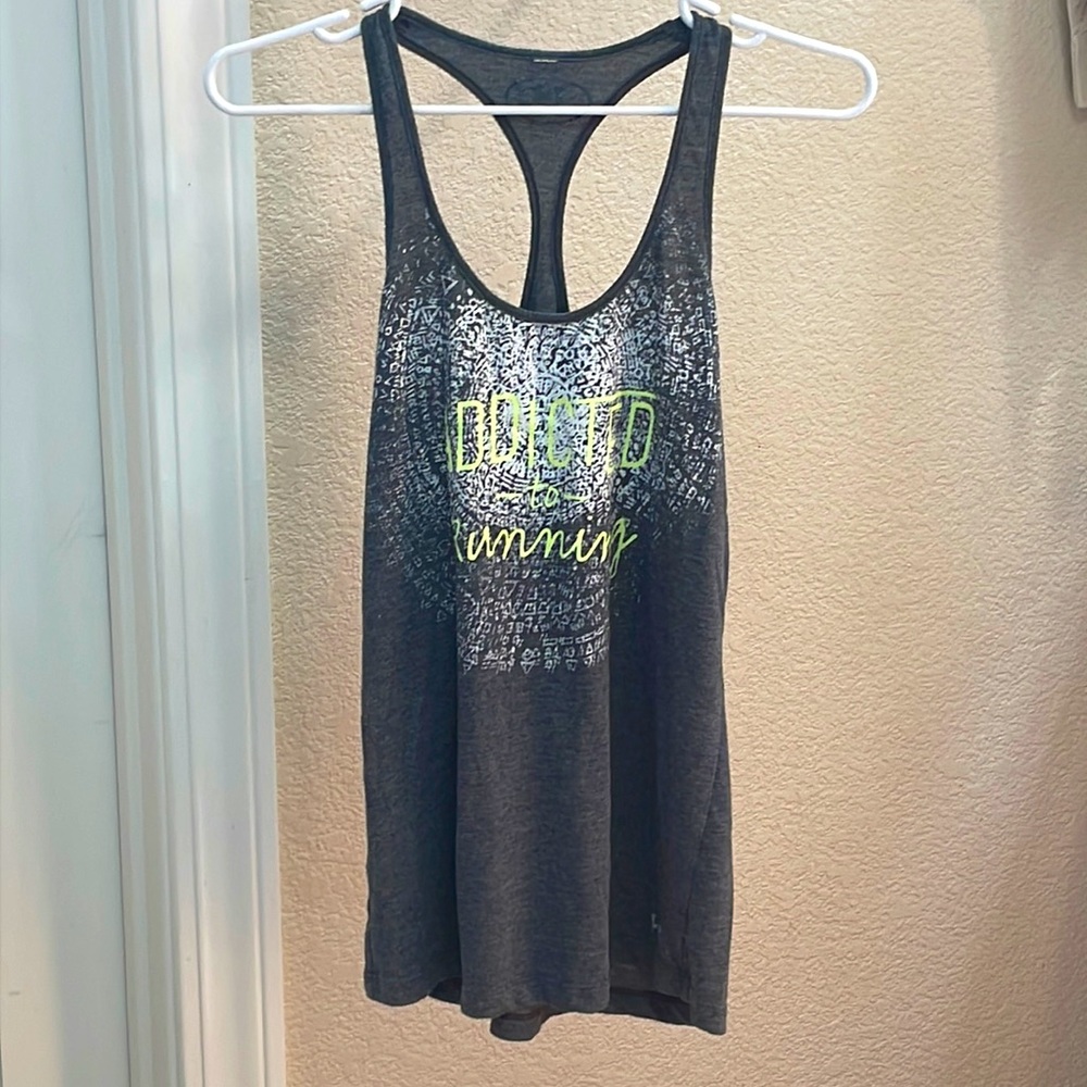 Under Armour “Addicted To Running” Small Tank
